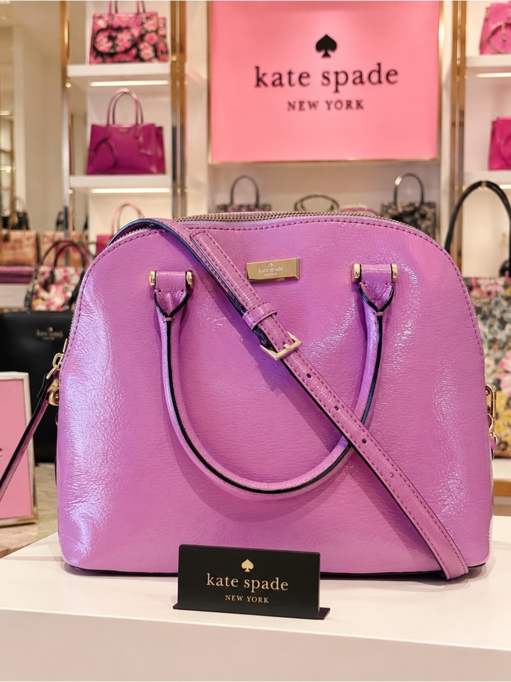 Kate Spade "Carli Place" satchel
lilac patent leather w/gold-tone
Hardware NWOT